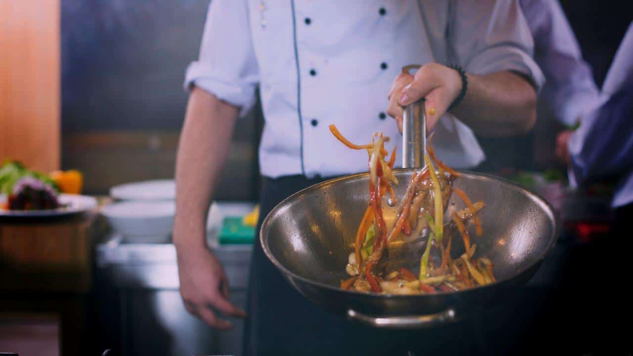 How To Use Wok On Glass Top Stove Like A Pro? (With Cleaning Tips)
